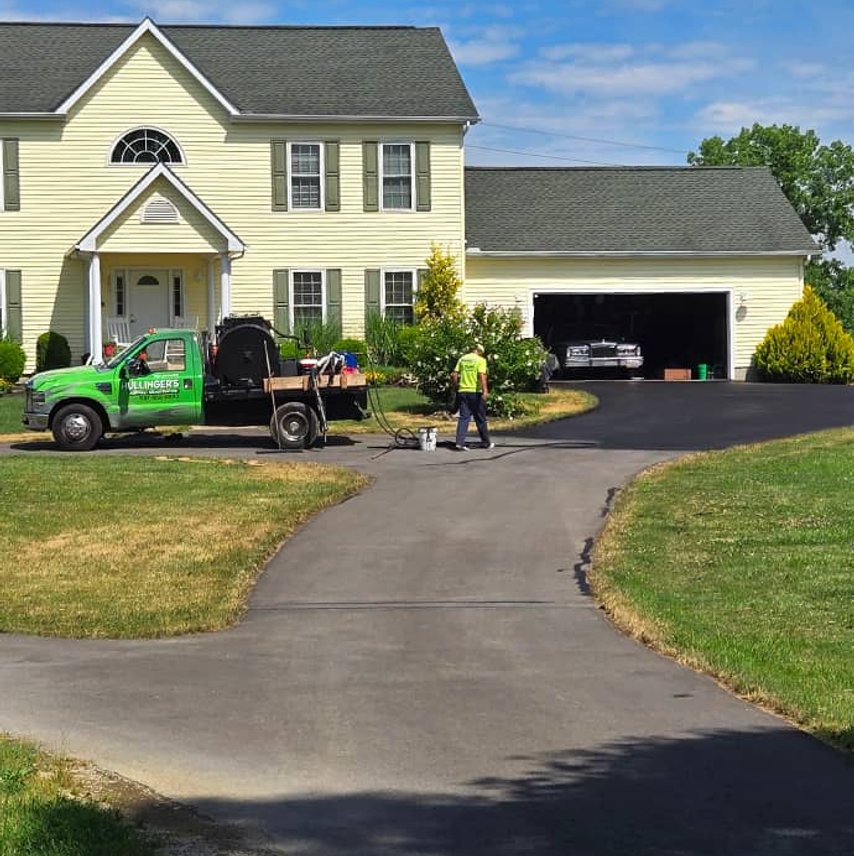 Sealcoating a residential driveway at a Delaware, OH home