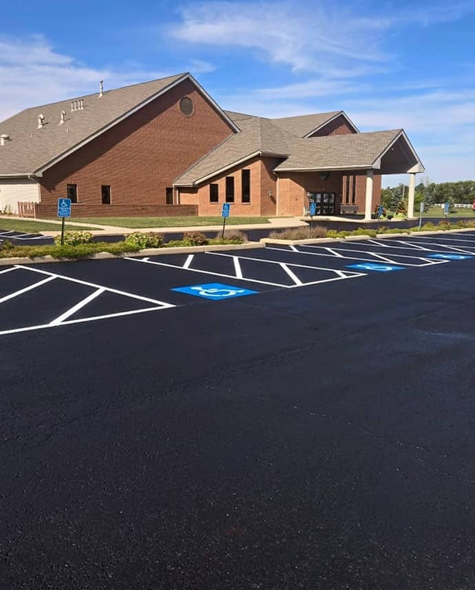 Freshly striped parking lot with ADA spaces in Plain City, OH